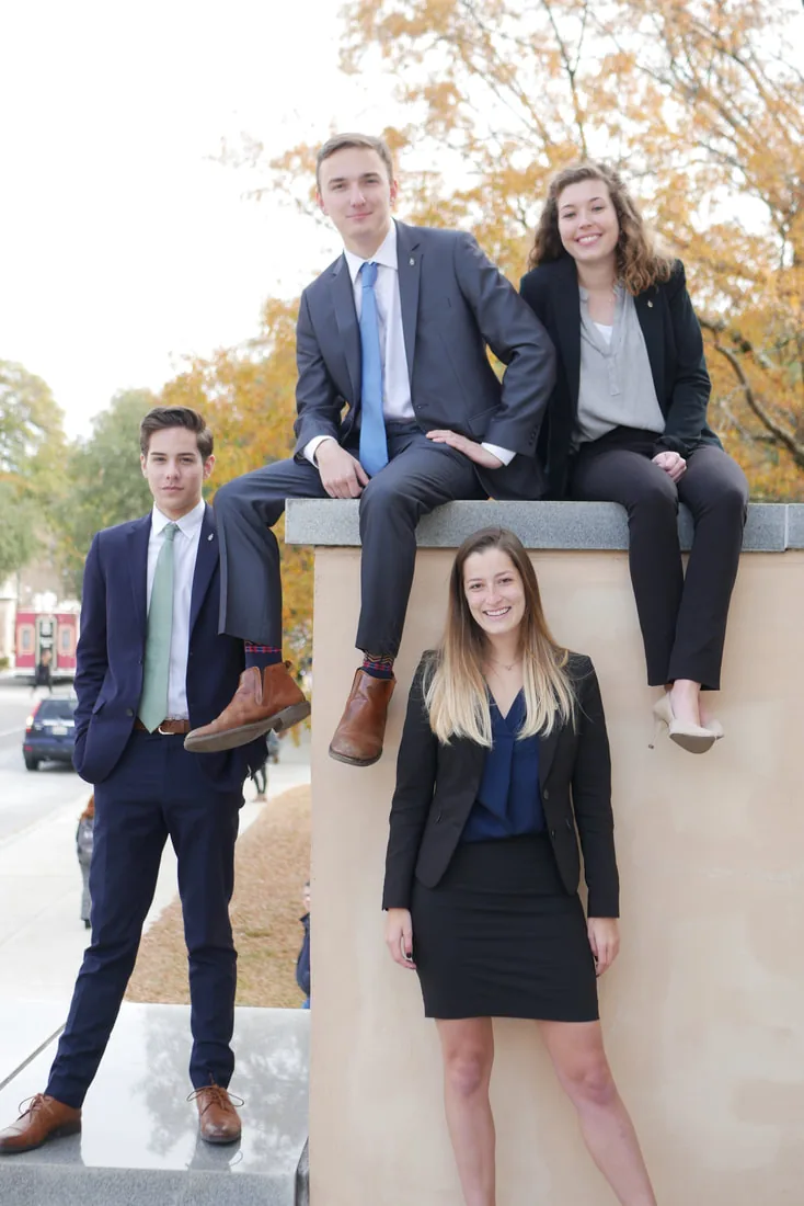 Brothers in business professional attire